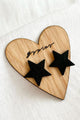 Star button earrings, black